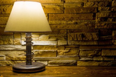 vintage table lamp on brown background clipart