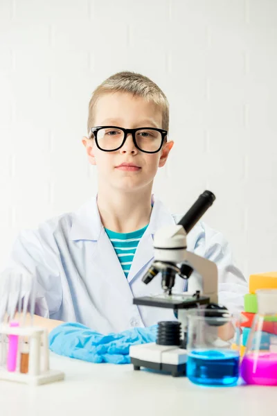 Schoolboy Microscope Examines Chemicals Test Tubes Conducts Experiments Portrait White — Stock Photo, Image