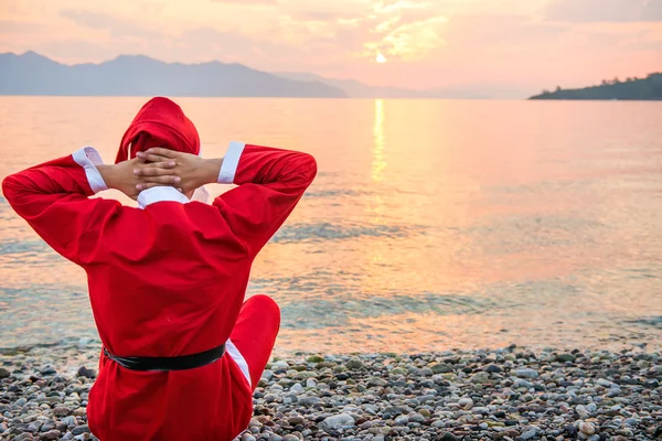 Summer vacation santa claus on the beach — Stock Photo, Image