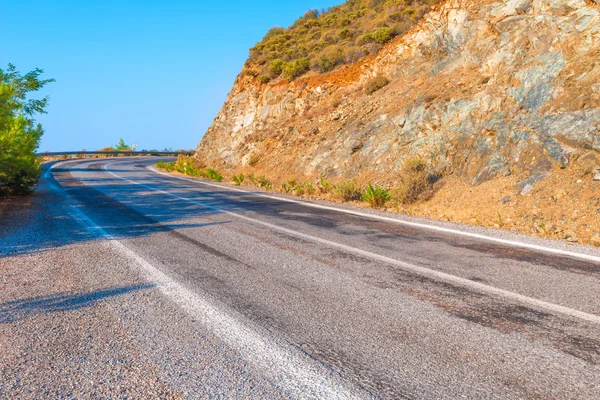 Rocky mountains and road with turns — Stock Photo, Image