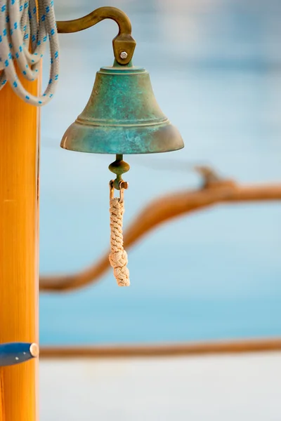 Old bell on board closeup — Stock Photo, Image