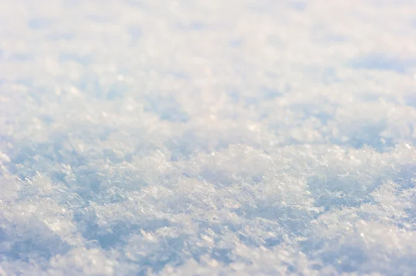 Neve fotografada de perto na luz solar — Fotografia de Stock