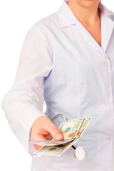 Hand van met dollars - een omkopen artsen — Stockfoto