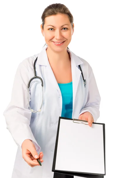 Smiling doctor giving a blank and pen isolated — Stock Photo, Image
