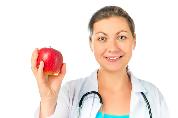 Beautiful therapist and juicy ripe apple — Stock Photo, Image