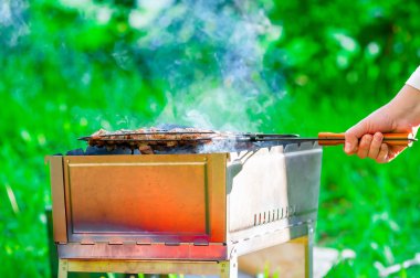 delicious meat cooked on the brazier outdoors