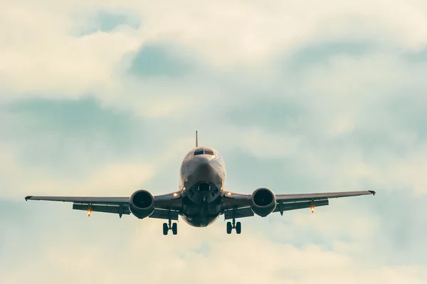 Moving passenger plane in the sky — Stok fotoğraf