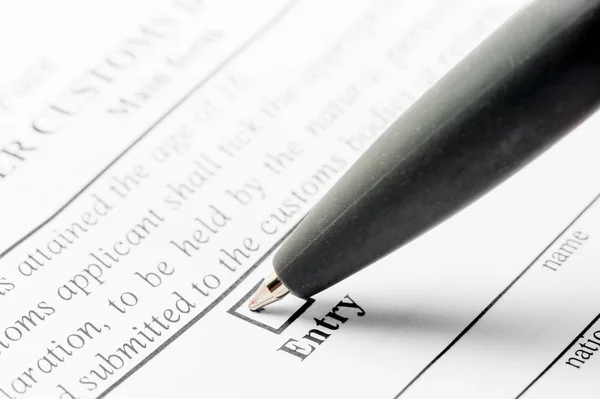 Ballpoint pen and declaration form close-up — Stok fotoğraf