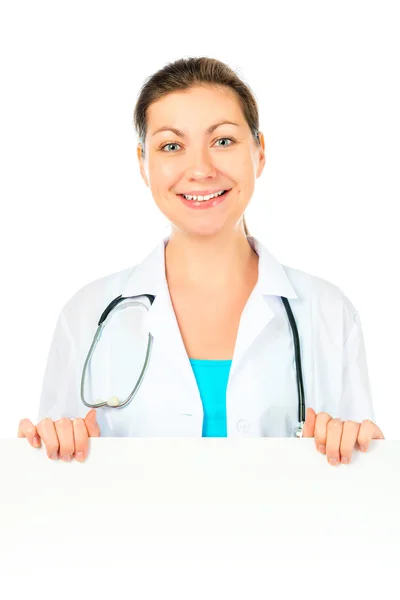 Retrato de um médico com um grande cartaz branco para inscrições — Fotografia de Stock