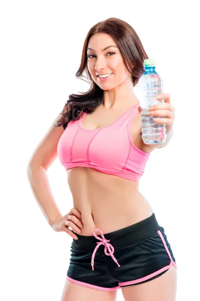 Athlete with water bottle on a white background — Stock Photo, Image