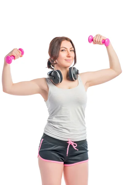 Vertical picture fitness instructor with dumbbells and headphone — Stock Photo, Image