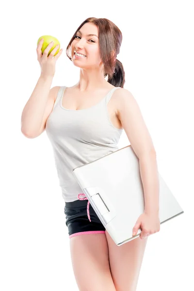 Woman tracking the her figure shot on a white background — Stock Photo, Image