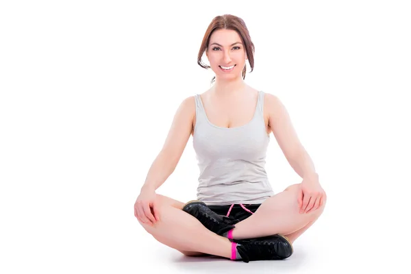 Young woman relaxing in lotus position — Stock Photo, Image