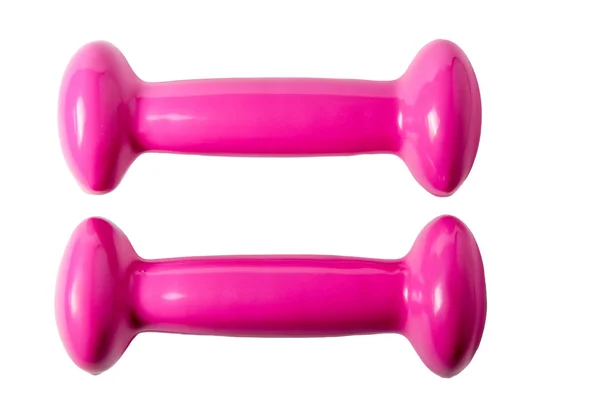 Two pink color dumbbells isolated closeup — Stock fotografie