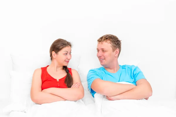 Loving couple looking at each other in bed — Stock Photo, Image