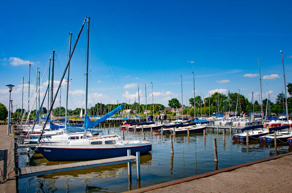 BOHMTE, GERMANY. JUNE 27, 2021 Dammer Natural Park. Yachts moored in the pier