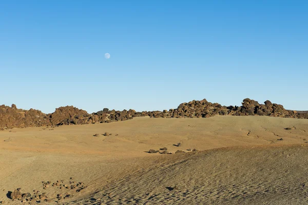 Volcano landscape with moon — Stock Photo, Image