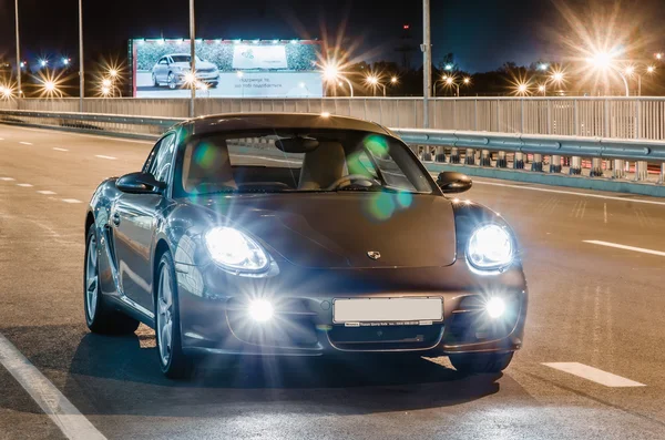 Kyiv, Ukraine - April 4th, 2014: Night photoshoot of Porsche Cayman near Boryspil Airport — Stock Photo, Image