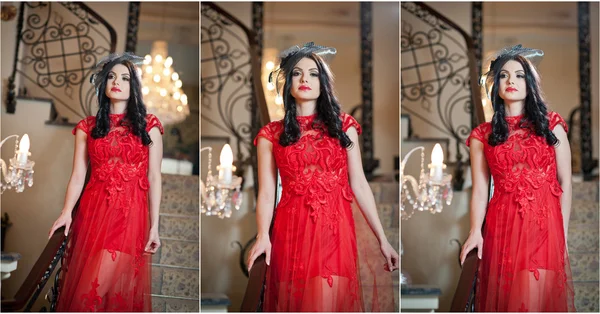 The beautiful girl in a long red dress posing in a vintage scene. Young beautiful woman wearing a red dress in an old hotel. Sensual elegant young woman in red long dress indoor shot. — Stock Photo, Image