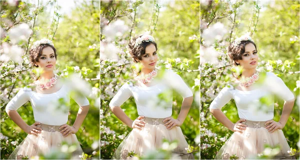 Retrato de una hermosa niña posando al aire libre con flores de los cerezos en flor durante un brillante día de primavera. Atractiva mujer morena con flores accesorios en huerto, tiro de primavera —  Fotos de Stock