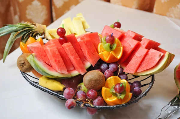 Carved fruits arrangement. Fresh various fruits. Assortment of exotic fruits. Fresh fruits decoration — Stock Photo, Image