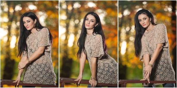 Beautiful woman in lace blouse posing in autumnal park. Young brunette woman spending time in forest during fall season. Long dark hair attractive woman smiling with faded leaves around her, outdoors — ストック写真