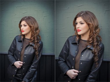 Siyah deri bir kıyafet, ceket ve pantolon, zemin üzerine koyu gri duvar ile sevimli genç esmer kadın. Seksi güzel genç kadın. Uzun kıvırcık saçlı şehvetli bir kadın portresi tam uzunlukta