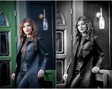 Şirin esmer siyah deri kıyafet yeşil boyalı kapı arka plan ile. Uzun kıvırcık saçlı seksi güzel genç kadın. Kırmızı dudaklar ve kışkırtıcı dekolte boyun ile şehvetli kadın portresi