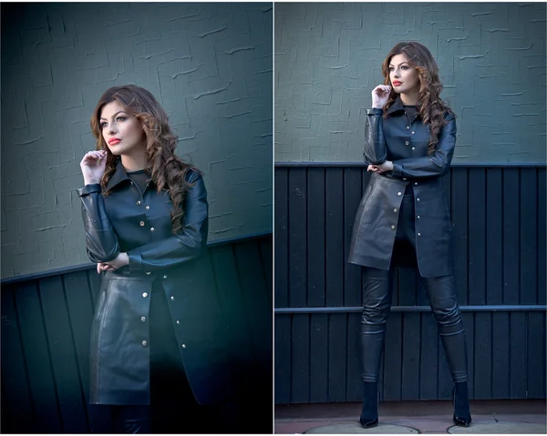 Charming young brunette woman in black leather outfit, coat and trousers, with dark gray wall on background. Sexy gorgeous young woman. Full length portrait of a sensual woman with long curly hair — Stock Photo, Image