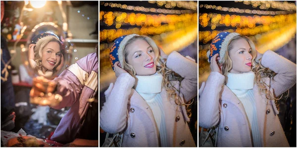 Portrait of young beautiful woman with long fair hair outdoor in cold winter evening. Beautiful blonde girl in winter clothes with xmas lights in background. Beautiful woman smiling in winter scenery — Stok fotoğraf