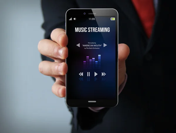 Müzik akarsu işadamı smartphone — Stok fotoğraf