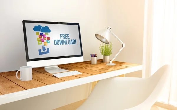 Workplace with free download on computer screen — Stock Photo, Image