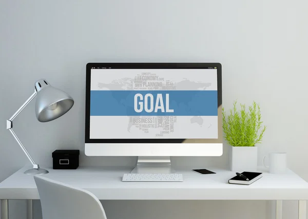 Modern workspace with goal text on screen — Stock Photo, Image