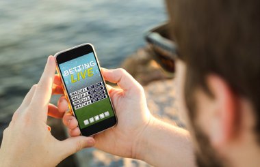 Kullanarak adam telefon online bahis için