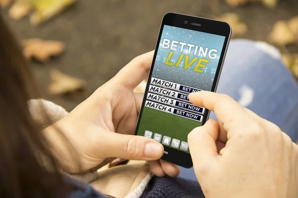Woman with betting website on screen — Stock Photo, Image