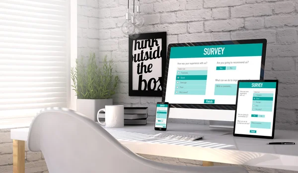 Devices with survey responsive web on screen — Stock Photo, Image