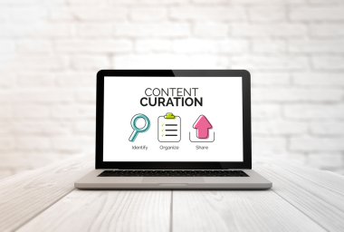 laptop with content curation graphic on screen clipart