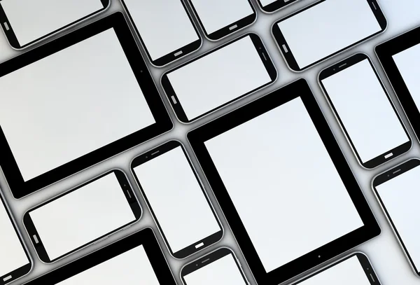 Üres okostelefonok és a tabletta — Stock Fotó