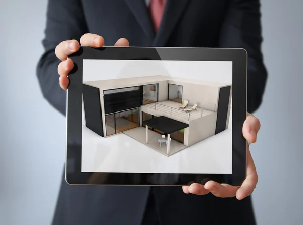 House design tablet affärsman — Stockfoto