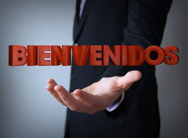 Welcome in spanish over businessman — Stock Photo, Image