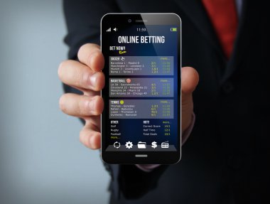 Dokunmatik telefon tutarak işadamı