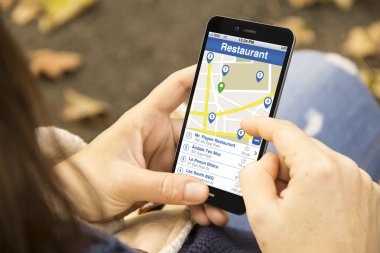 young woman searching for a restaurant