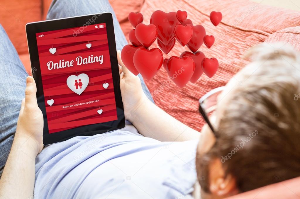 man online dating on a tablet