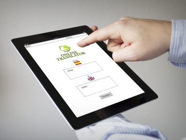 hands with tablet with online translator
