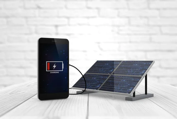 Telefon nabíjení pomocí solárního panelu — Stock fotografie