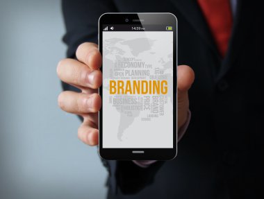 işadamı bir 3d oluşturulan holding smartphone