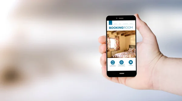 Teléfono móvil con sitio web de reserva en pantalla —  Fotos de Stock