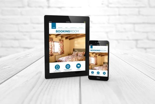 Tablet and smartphone with booking website on screen — Stok fotoğraf