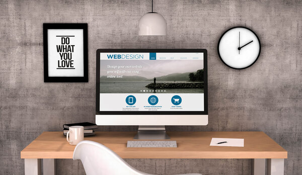 workspace computer with web design site