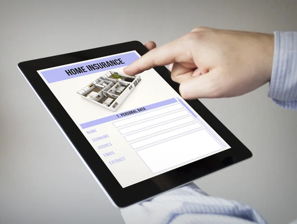 Hands with tablet with home insurance on the screen — Stock Photo, Image